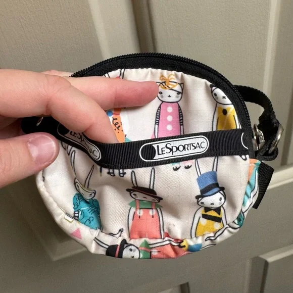 LeSportsac Round Wristlet Pouch in Cream with Multicolor Bunny Picnic Print - Picture 3 of 10